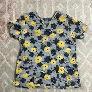 Scrub top yellow and gray flowers